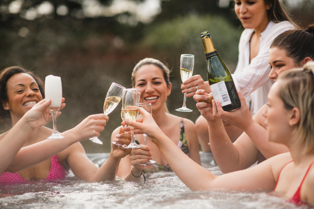 friends relaxing in hot tub together