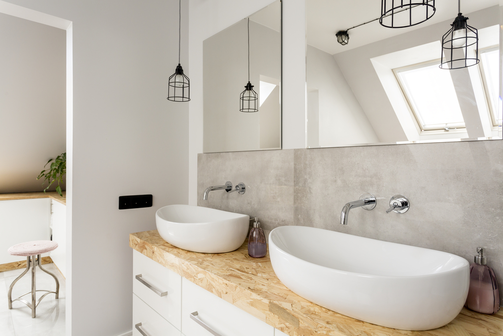 minimalist white bathroom with two sinks